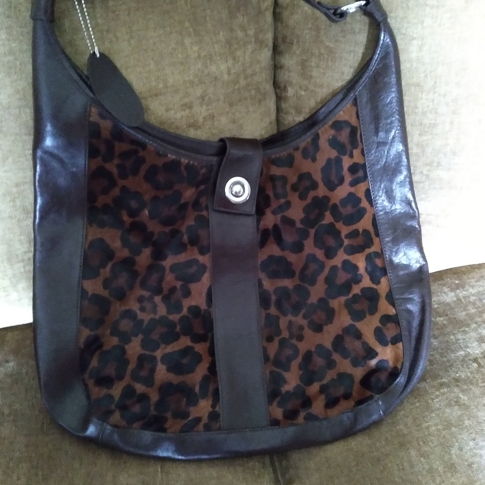 Leather Wilson's Leather hobo with calf hair.